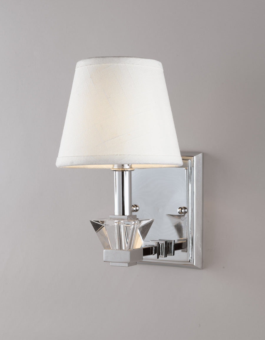 Quoizel Deluxe DX8701C chrome wall sconce with a tapered white shade and faceted clear accent.