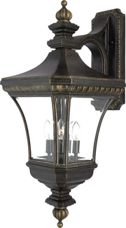 Quoizel Devon DE8414IB wall lantern with three candle lights, clear glass and an Imperial Bronze frame