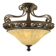 Quoizel ornate semi-flush ceiling light with amber mottled bowl, pierced rim and scrolling supports.
