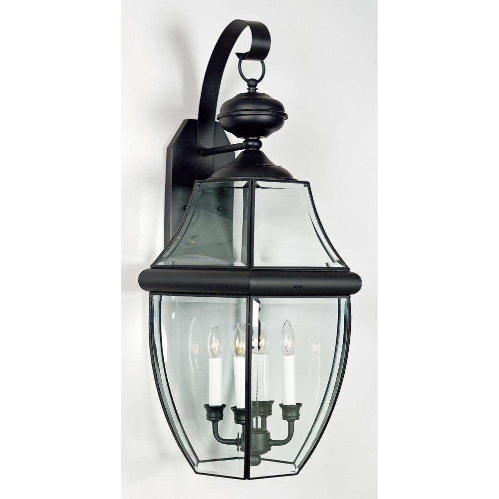 Quoizel Newbury black outdoor wall lantern with clear panels and four candle lights