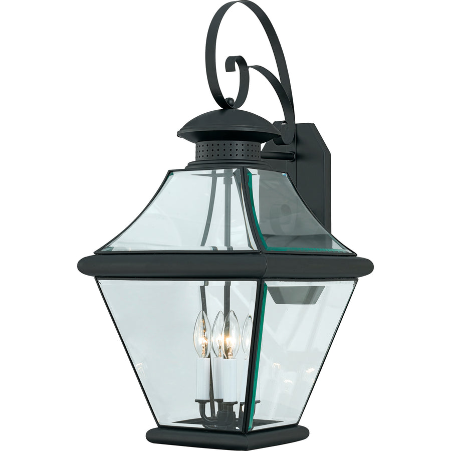 Quoizel Rutledge RJ8414K lantern showing the Mystic Black frame, tapered panels and candle-style centre