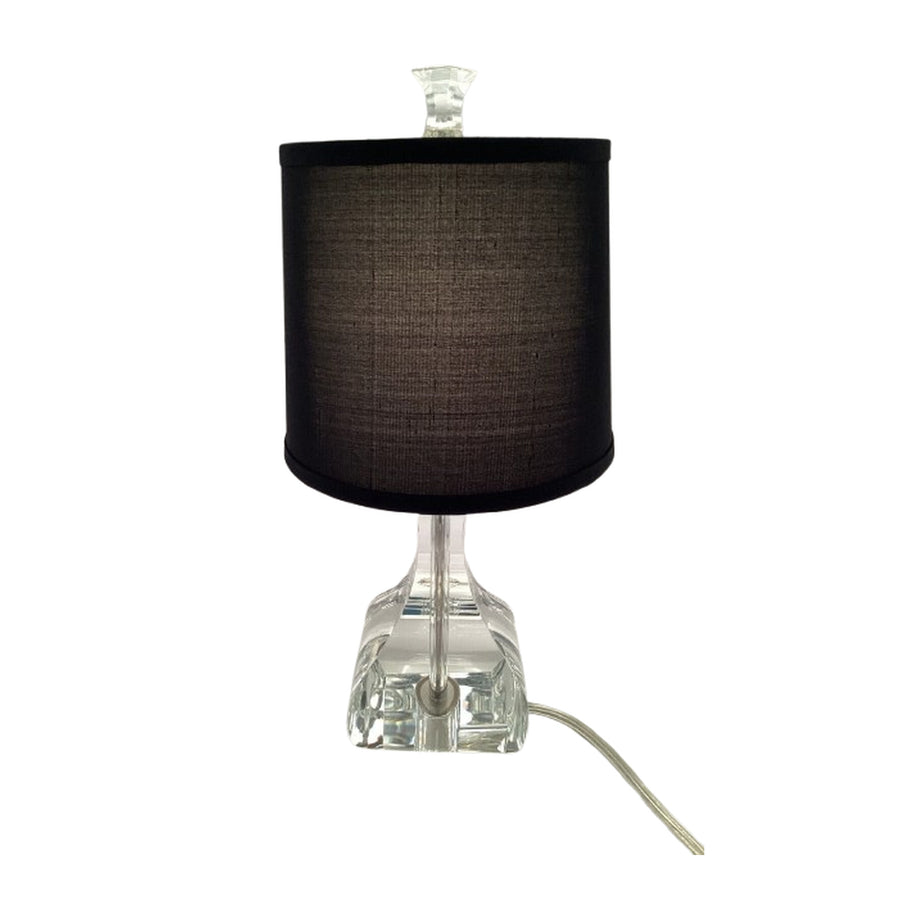 Robert Abbey Brigette table lamp showing a black shade, faceted clear base and clear finial