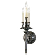 Horatio wall sconce with clustered candle-style lights, ornate round backplate and long bronze finial.