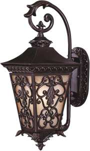 Savoy House ornate outdoor wall lantern with dark scrollwork and amber panels
