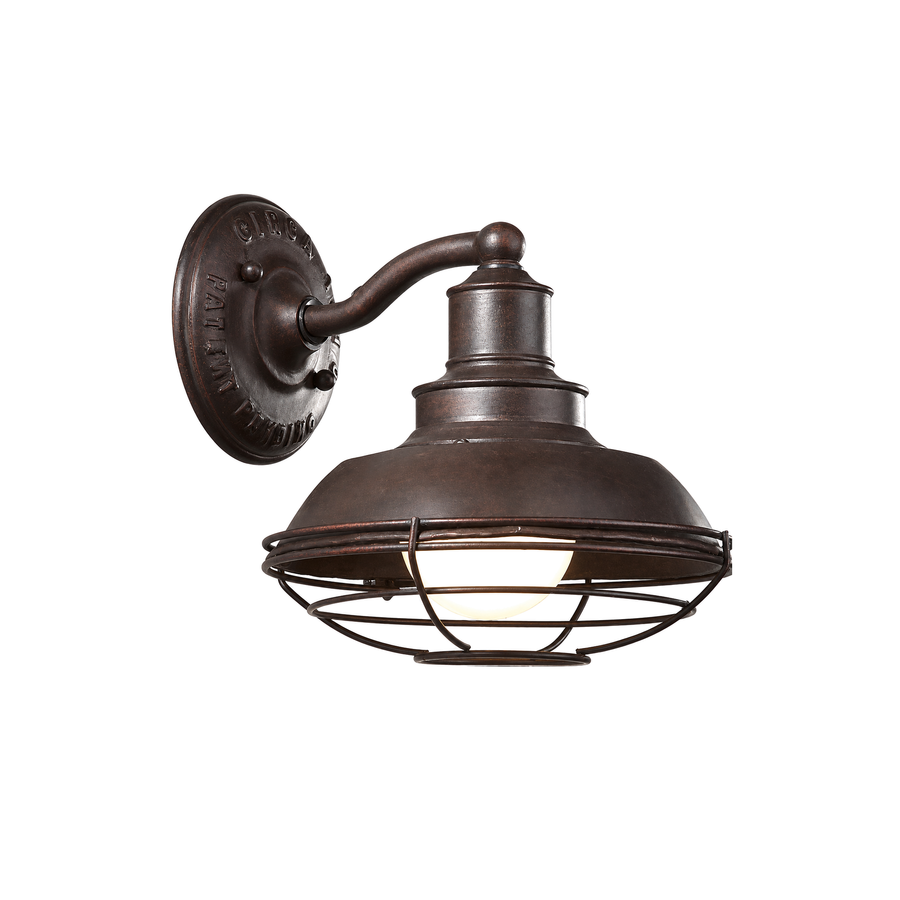 Troy Lighting Circa 1910 Old Rust wall light with a domed shade, wire guard and curved arm