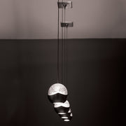 WAC Genesis MP-LED311 brushed nickel LED pendants in a staggered multiple-light installation