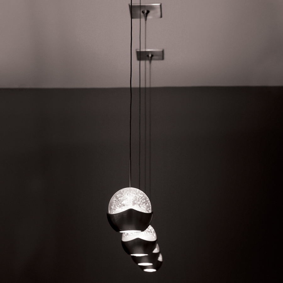 WAC Genesis MP-LED311 brushed nickel LED pendants in a staggered multiple-light installation