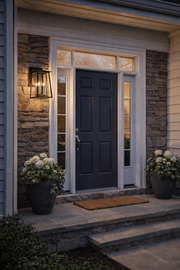 Walker wall lantern beside an exterior entrance