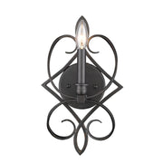 Golden Selene aged-bronze wall sconce with a central diamond frame, scrolling arms and a single candle sleeve
