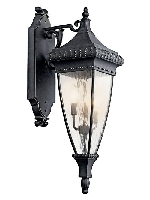 Kichler Venetian Rain wall lantern with tapered glass, ornate black frame and gold highlights